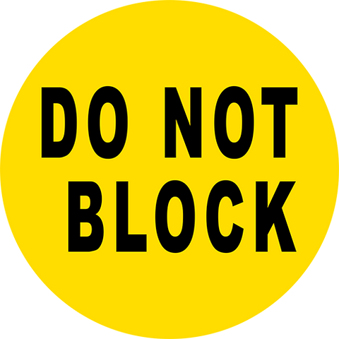 Floor Sign with do not block message - yellow circle with black text