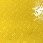 Close up detail view of Might Tac Tape diamond plate surface texture