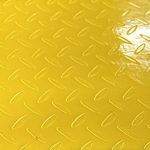 Close up detail view of Might Tac Tape diamond plate surface texture