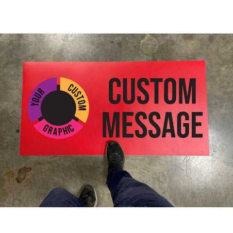 Sample Custom Floor Sign on concrete floor with custom graphic on the left side of the sign with custom text on the right. Pedestrian walking over the custom decal.