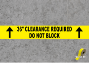 Heavy duty Floor Tape with do not block message on warehouse concrete