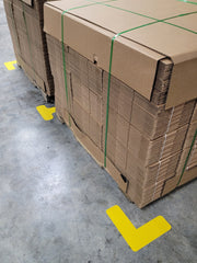 Floor Marking Corners locating two pallets with a floor marking T on a warehouse floor