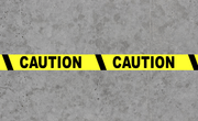 Caution Floor Tape - Message on concrete warehouse floor