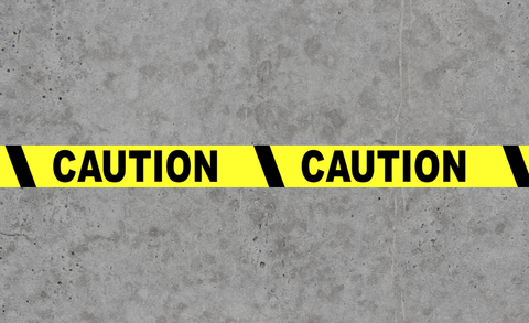 Caution Floor Tape - Message on concrete warehouse floor