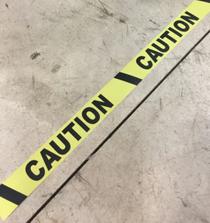 Caution Floor Tape on a warehouse floor