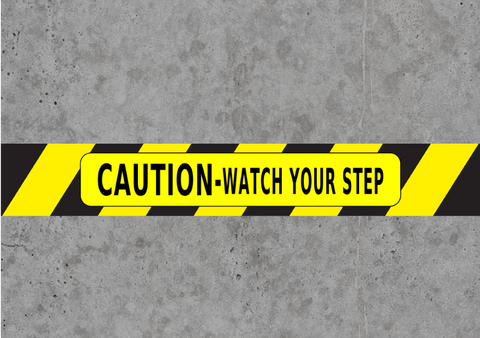 Caution watch your step floor tape - message on warehouse concrete