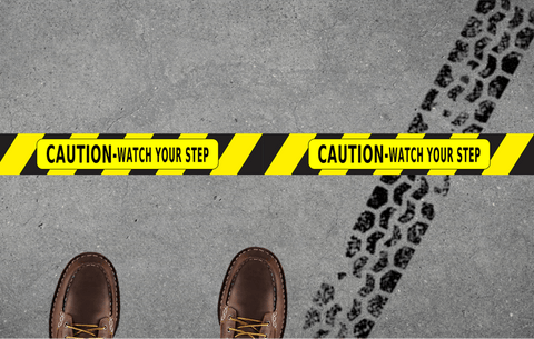 Watch your step floor tape on warehouse concrete floor - forklift and pedestrian traffic