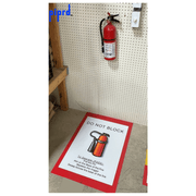 Floor Sign for fire extinguisher in front of fire extinguisher with operational instructions installed on facility concrete floor