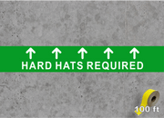 Floor Tape on concrete with hard hats required message 