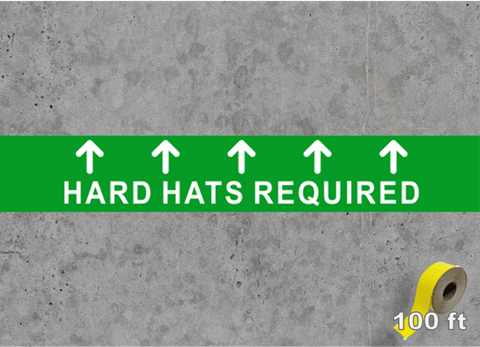 Floor Tape on concrete with hard hats required message 