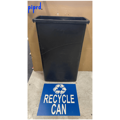 Peel and stick Recycle Can floor sign in front of black recycle bin