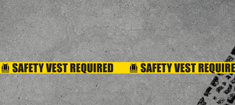 Heavy Duty Floor Tape - Safety Vest message on warehouse floor with traffic